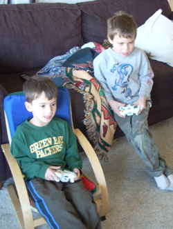Nikko and Timmers playing Xbox 360 - photo by Rokker